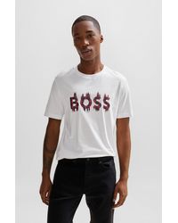 BOSS - T-shirt Regular Fit en jersey de coton avec motif artistique saisonnier - Lyst