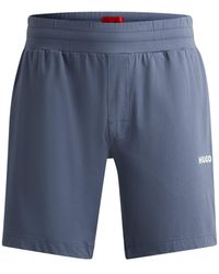 HUGO - Shorts aus elastischer Baumwolle mit Kontrast-Logo und Kordelzug - Lyst