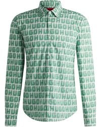 HUGO - Slim-Fit Hemd aus elastischer Baumwoll-Popeline mit Logo-Print - Lyst