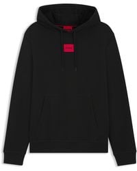 HUGO - Hoodie Van Katoenen Sweatstof Met Rood Logolabel - Lyst