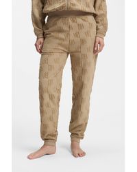 HUGO - Cotton-Blend Tracksuit Bottoms With All-Over Logo Pattern - Lyst
