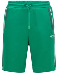 BOSS by HUGO BOSS Shorts regular fit en mezcla de algodón con bloques de color - Verde