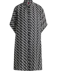 HUGO - Strandkleid mit kurzen Ärmeln und Allover-Logo-Print - Lyst
