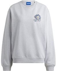 HUGO - Sweatshirt aus Baumwoll-Terry mit Grafik-Prints der Saison - Lyst