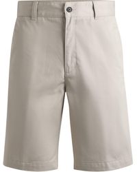HUGO - Regular-Fit Shorts mit schmalem Beinverlauf und geknöpften Taschen - Lyst