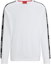 HUGO - Sweatshirt aus Baumwoll-Terry mit Logo-Tape und gerippten Bündchen - Lyst