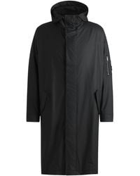HUGO - Regenmantel Mit Kapuze Und Verdecktem Verschluss - Lyst