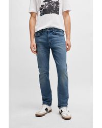 BOSS - Slim-fit Jeans In Mid-blue Soft Stretch Denim - Lyst