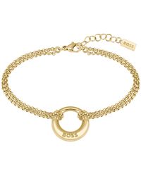 BOSS - Bracelet doré avec pendentif anneau logoté - Lyst