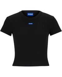HUGO - Slim-Fit T-Shirt in Cropped-Länge mit blauem Logo-Label - Lyst
