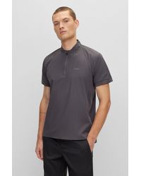 BOSS - Zip-neck Slim-fit Polo Shirt With Decorative Reflective Print - Lyst