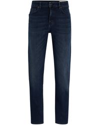 BOSS - Regular-Fit Jeans aus marineblauem Super-Stretch-Denim - Lyst