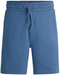 HUGO - Shorts aus Baumwoll-Terry mit Logo-Tape an den Seitennähten - Lyst