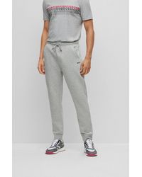 BOSS - Regular-fit Tracksuit Bottoms With Multi-coloured Logos - Lyst