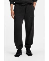 HUGO - Relaxed-Fit Cotton Trousers With Streetwear Logo - Lyst