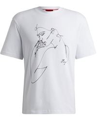 HUGO - Relaxed-fit T-shirt Van Katoenen Jersey Met Print Van Een Gezicht - Lyst