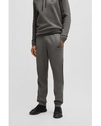 BOSS - Regular-fit Knitted Tracksuit Bottoms With Stripes And Branding - Lyst