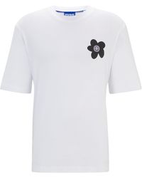 HUGO - T-shirt Van Katoenen Jersey Met Gebloemd Logo-artwork - Lyst