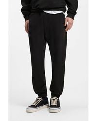 HUGO - Cotton-Terry Tracksuit Bottoms With Gradient Logo - Lyst