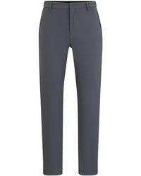 BOSS - Pantalon Slim Fit en jersey stretch performant - Lyst