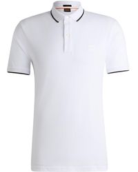 BOSS - Slim-Fit Poloshirt aus gewaschenem elastischem Baumwoll-Piqué - Lyst