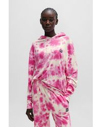 HUGO - Stacked-logo Relaxed-fit Hoodie With Seasonal Print - Lyst