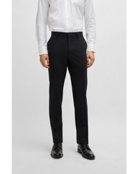 BOSS - Pantalon Regular Fit en laine vierge stretch - Lyst