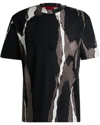 HUGO - T-Shirt aus Baumwoll-Jersey mit saisonalem Print und Stack-Logo - Lyst