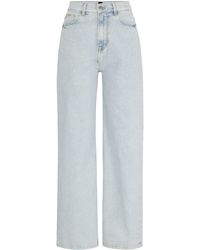 BOSS - Jeans aus blauem Stretch-Denim mit weitem Beinverlauf - Lyst