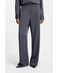 HUGO - Relaxed-Fit Trousers With Stacked Logos - Lyst