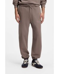 HUGO - Relaxed-Fit Cotton Trousers With Streetwear Logo - Lyst