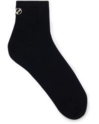 BOSS - Kurze Ripp-Socken mit metallenem Logo - Lyst
