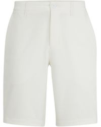 BOSS - Slim-Fit Shorts aus bügelleichtem Vier-Wege-Stretch - Lyst