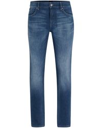BOSS - Blaue Slim-Fit Jeans aus italienischem Denim mit Kaschmir-Haptik - Lyst