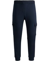 BOSS - Cotton-terry Tracksuit Bottoms With Cargo Pockets - Lyst
