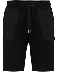 HUGO - Relaxed-Fit Shorts aus Stretch-Baumwolle mit Kontrast-Taschen - Lyst