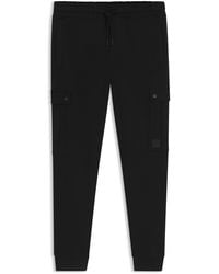 BOSS - Relaxed-Fit Cotton-Terry Tracksuit Bottoms With Cargo Pockets - Lyst