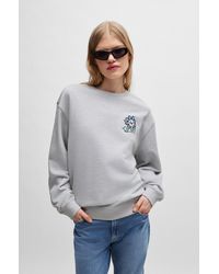 HUGO - Cotton-terry Sweatshirt With Seasonal Graphic Prints - Lyst