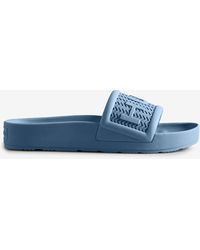 HUNTER Sandals, slides and flip flops 