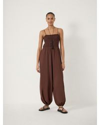 Hush - Vita Strappy Bubble Hem Jumpsuit - Lyst