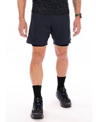 Mizuno - Trail Multipocket 2 En 1 - Lyst