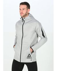 chaqueta reebok hombre dorados