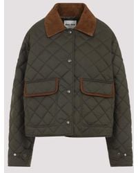 ブルゾン Miu Miu Giubbino Miu Miu Logo Oversized Track Jacket in Black | Lyst