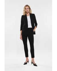 Imperial - Pantalon 7/8 skinny à fines rayures et poches verticales - Lyst