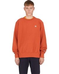 orange crew neck sweater