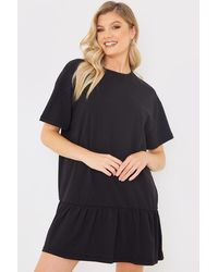 In The Style - Peplum Hem Dropped Shoulder T-Shirt Dress - Lyst