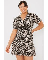 In The Style - Animal Print Short Sleeve Wrap Swing Dress - Lyst