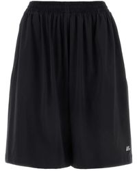 Balenciaga - Logo-Print Track Shorts - Lyst