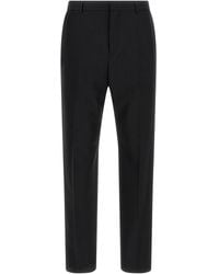 Saint Laurent - Saint Laurent Pinstriped Wool Trousers - Lyst