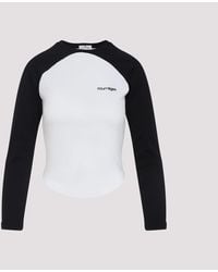 Courreges - Long-Sleeved Contrast T-Shirt With Rounded Hem And Logo Print - Lyst